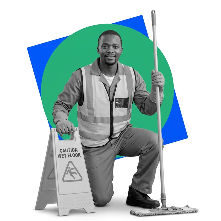 A cleaner with a mop beside a wet floor sign